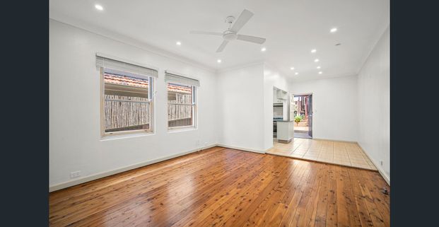 Spacious 4 Bedroom Oasis - Photo 1