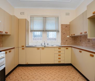 Neat Family Home in a Prime Family-Friendly Location - Photo 5