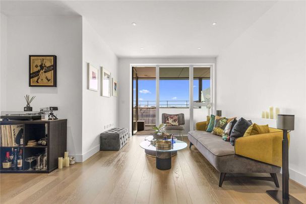 A contemporary two bedroom apartment to rent in a modern development in Kensal Rise boasting City skyline views. - Photo 1