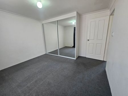 MODERN TWO BEDROOM APARTMENT IN A GATED COMMMUNITY - Photo 2