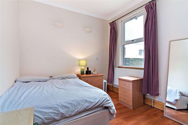 Three bedroom ground floor flat with a patio garden. - Photo 1