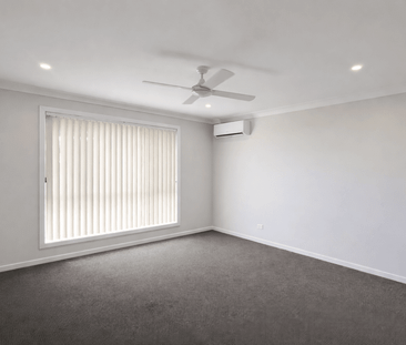 Stylish Family Home with Space & Comfort - Photo 5