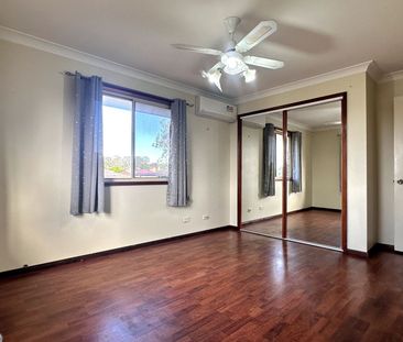 Comfortable 3 Bedroom Home with Great Features & Secure Outdoor Living - Photo 5