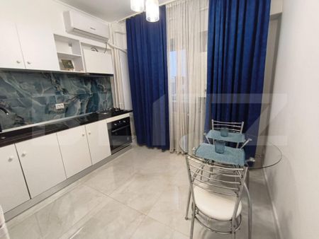 Garsoniera de inchiriat, 45 mp, centrala proprie, zona Cent - Fotografie 5