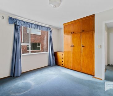 Comfortable 2-Bedroom Living in Convenient New Town - Photo 1