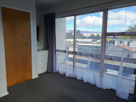 Convenient Two-Bedroom Unit - Photo 2