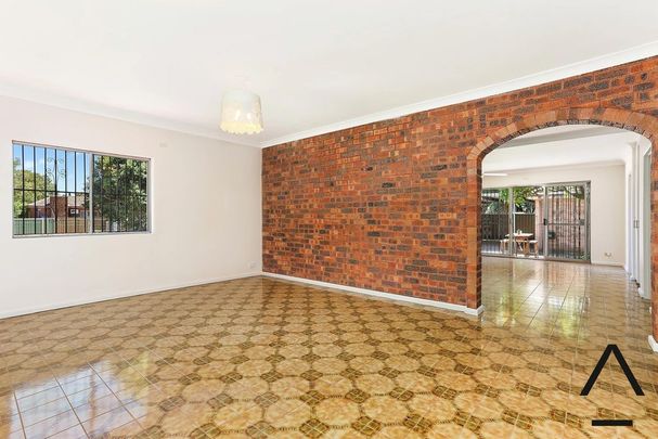 Expansive Six-Bedroom Home in Peaceful Riverside Pocket - Photo 1