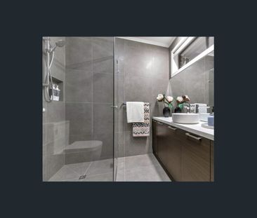 Contemporary Townhouse with Modern Comforts and Prime Location - Photo 1