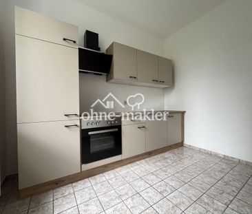 2-Raumwohnung im 1. OG mit Balkon und EBK - Foto 1