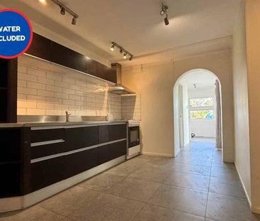 3-Bedroom Downstairs Unit in the Heart of Paku... - Photo 4