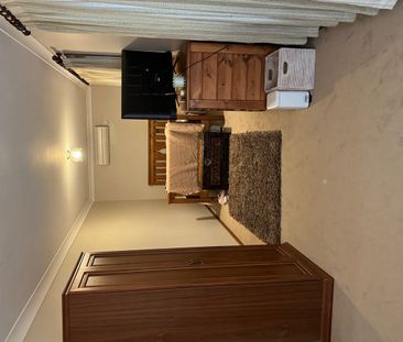 Furnished 3-Bedroom Home - Photo 4