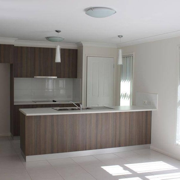 Luxury in low-maintenance living! - Photo 1