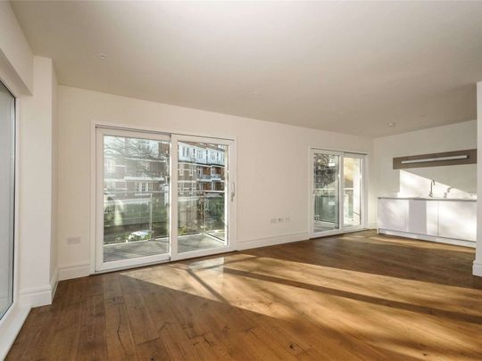 A stunning two bedroom, two bathroom apartment in this brilliant portered development moments from East Putney underground station. - Photo 1