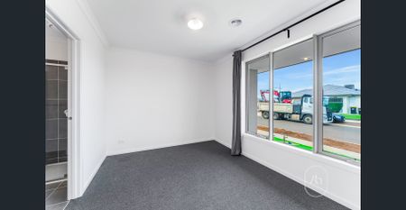 Modern 4-Bedroom Family Home with Solar Panels - Photo 3