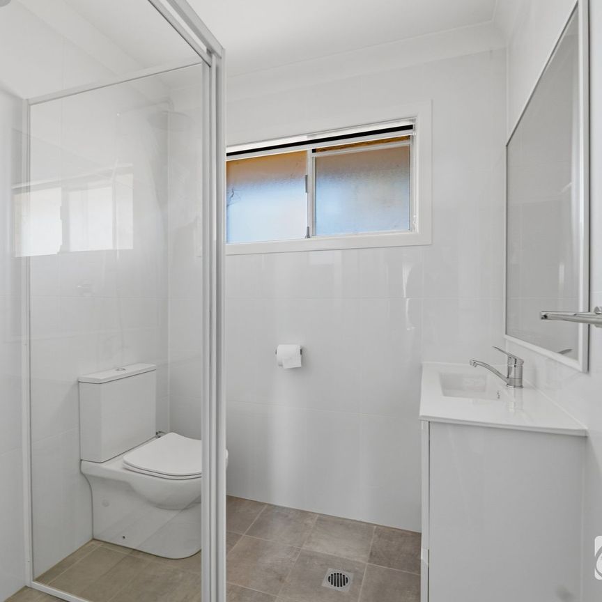 RENOVATED SPLIT LEVEL LIVING - Photo 1