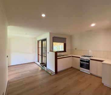 FRESHLY UPDATED FAMILY HOME IN A SPACIOUS SETTING! - Photo 5