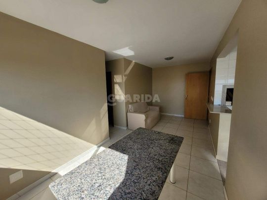 Apartamento semi mobiliado de 2 dormitórios, sendo 1 suíte, no bairro Passo d’Areia. - COD: 4124 - Photo 1