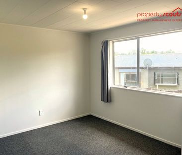 Comfortable 4-Bedroom Home With Large Yard & Rumpus - Photo 1