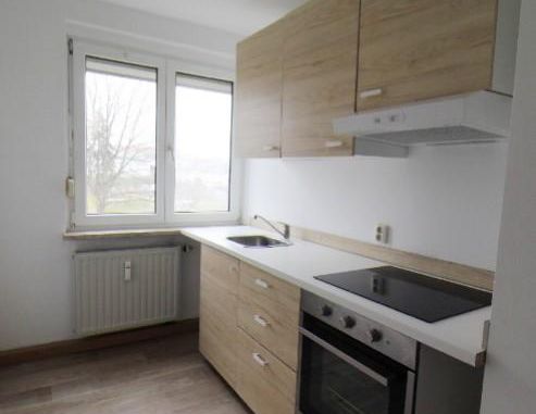 Zweckmäßige 3-Zimmer-Wohnung mit Einbauküche - Foto 1