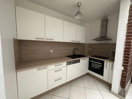 Location Maison 7 pièces 146 m2 à Saint-Quentin - Photo 2