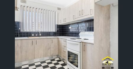 "Neat & Spacious 2-Bedroom Unit" - Photo 5