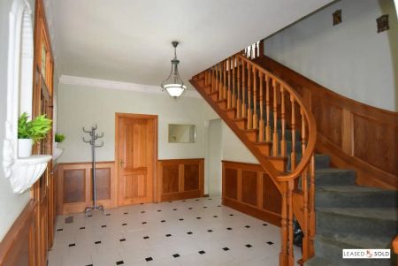 “Spacious Family Living with Dual Kitchens and Versatile Lower Level” - Photo 3