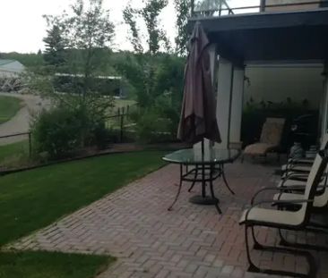 Secondary suite backing on to Golf Course . Bow river by Golf cours... - Photo 1