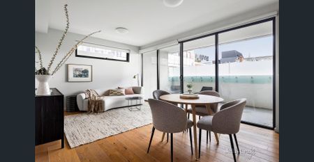 Contemporary Dual-Level Apartment in Vibrant City-Edge Location - Photo 3