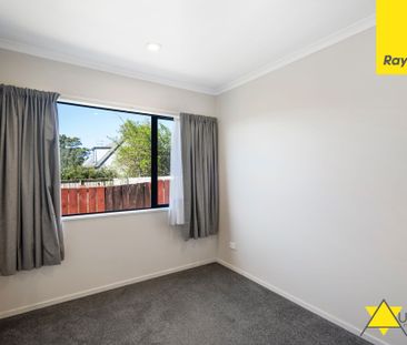 This beautifully renovated three-bedroom home in Ranui is ready for... - Photo 1