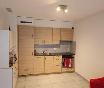 Appartement de 2.5 pièces au 2ème étage avec grand balcon - Photo 1