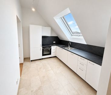 Hochwertiger Dachgeschoss-Erstbezug mit Balkon - Foto 3