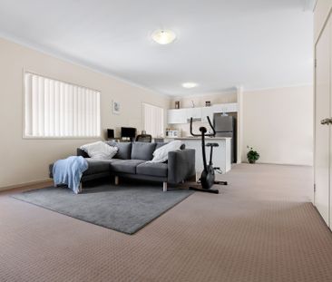 Nestled in a peaceful complex, this delightful two-bedroom unit off... - Photo 6