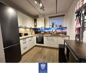 Traumhafte Neubauwohnung mit großem Balkon! - Foto 1