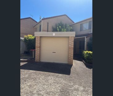 LOW MAINTENANCE & PRIVATE COURTYARD - Photo 1