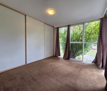 Freshly Painted, Perfectly Positioned Three Bedroom! - Photo 1