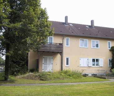 Terrassenwohnung mit Reihenhauscharakter wartet auf ruhige Bewohner - Photo 1