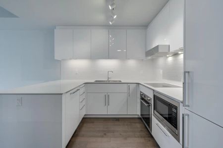 Legends Private Residences — 1 Bed 1 Bath - Photo 3