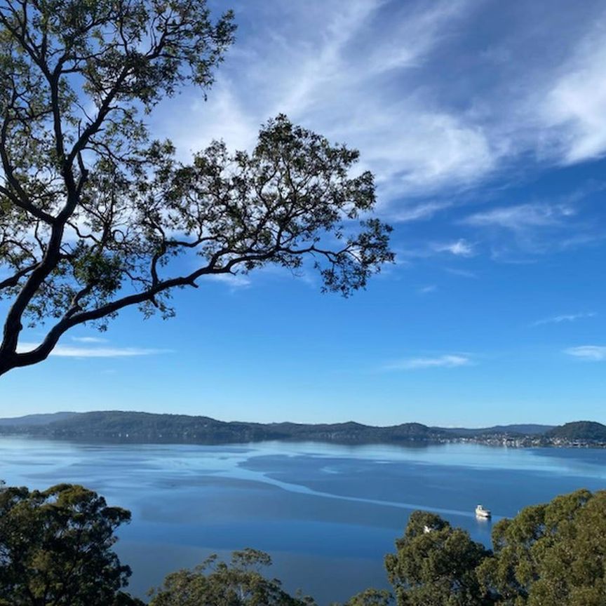 Executive Family Residence With Sweeping Water and Bush Views! - Photo 1