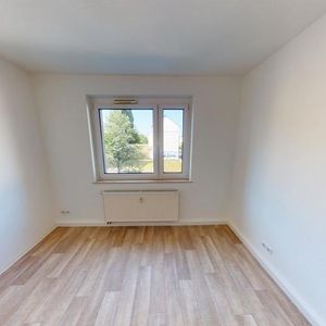 Mit Blick ins Grüne gelegene 2-Raum-Wohnung mit Balkon - Foto 2