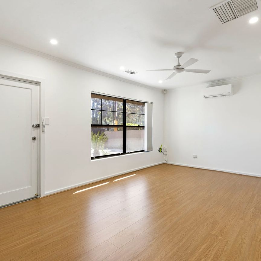 Spacious Family Living with Renovated Interiors and Extensive Outdoor Space - Photo 1