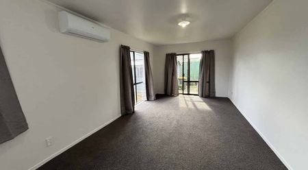 Recently Renovated 3-Bedroom Home with Big Section & Open Garage - Photo 2