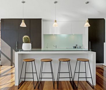 Sunlit Top-Floor Apartment with Balcony & Skyline Views in Resort-S... - Photo 6