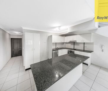 UNIQUE TWO-STOREY LIVING AT ITS BEST - Photo 6