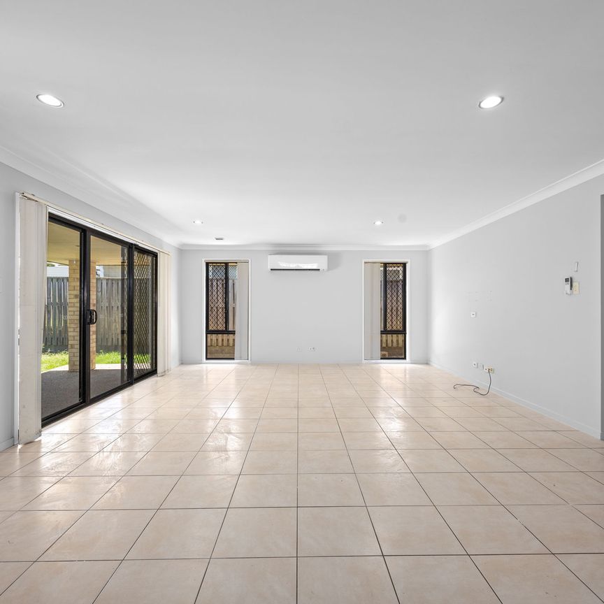 55 Rasmussen Cr, Redbank Plains QLD 4301 - House For Rent | Domain - Photo 1