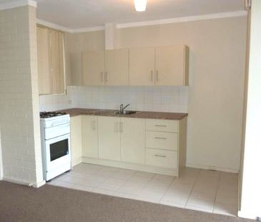 AFFORDABLE CONVENIENTLY LOCATED APARTMENT... DONT MISS OUT! - Photo 1