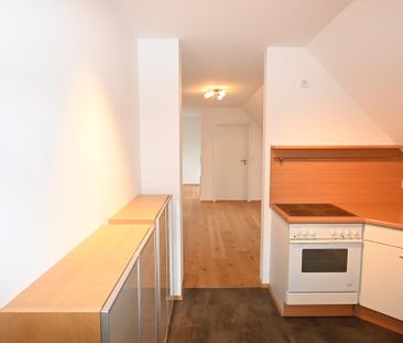 Ideal für Pendler und Single! Modernisierte 1-Zi.-DG-Wohnung mit Kf... - Foto 4