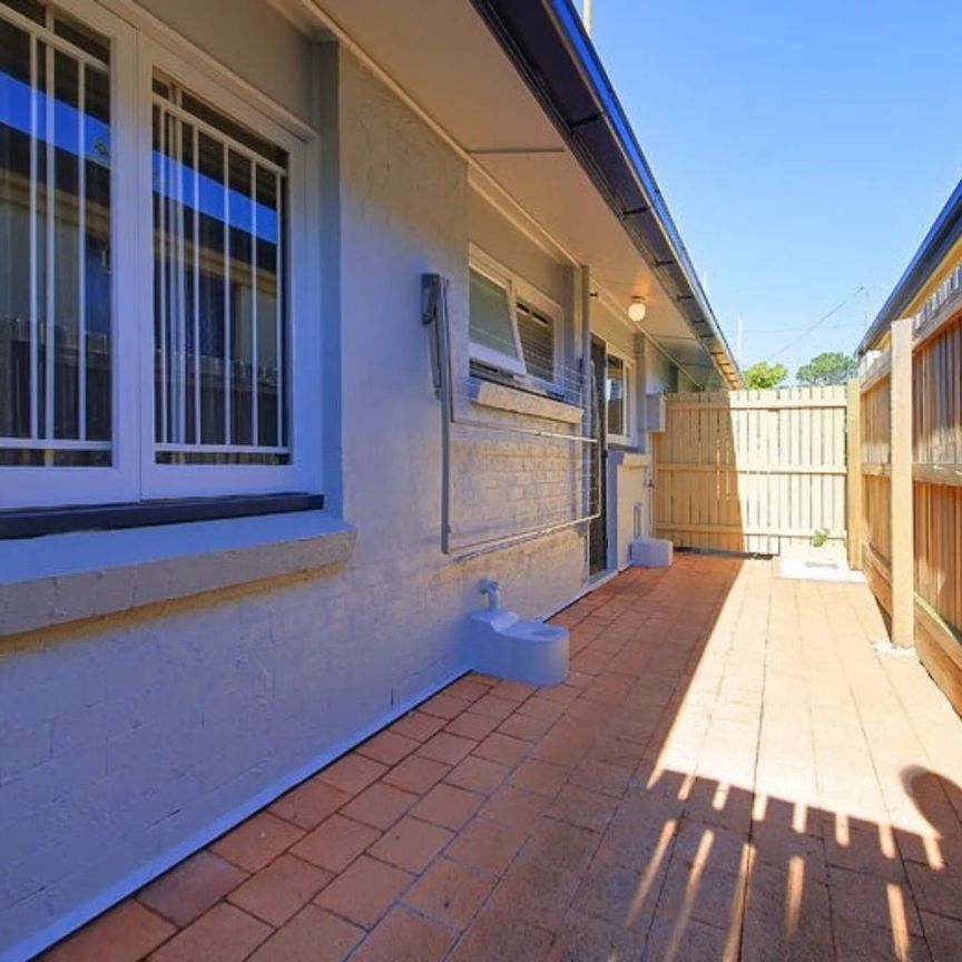 Tidy Unit in Perfect Location - Photo 1
