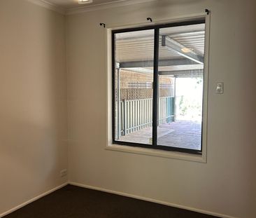 Raine & Horne are pleased to present this large 4 bedroom Family Home - Photo 2