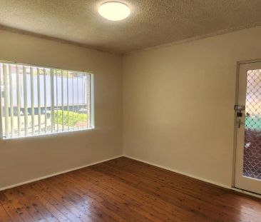 CONVENIENTLY LOCATED TWO BEDROOM UNIT - Photo 4