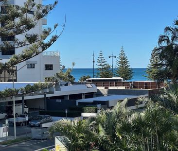 Walk to the beach or sit on your balcony inhaling the sea breeze. - Photo 6